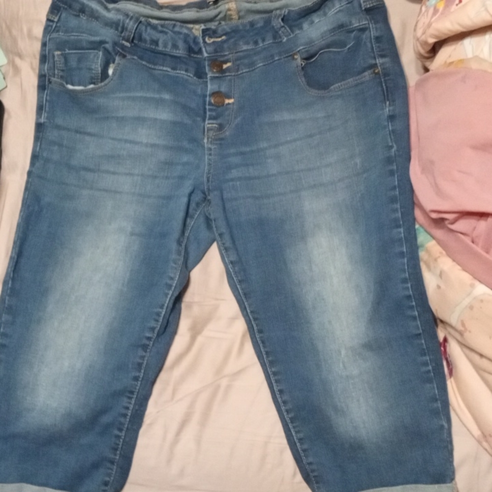Size 14 button fly, denim capris by Blue Savvy. Short folds at the bottom